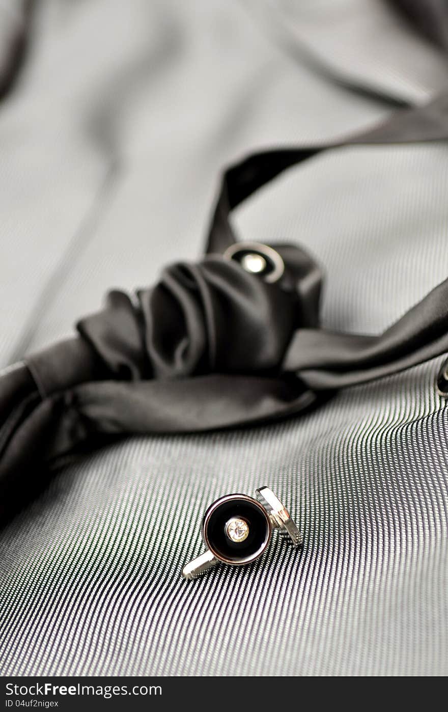 Detail from a groom tie and cufflinks. Detail from a groom tie and cufflinks