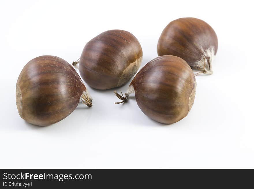 Nice shot of some chestnuts isolated on white background