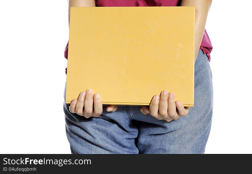 Woman bring book with her hand isolated over white background. Woman bring book with her hand isolated over white background