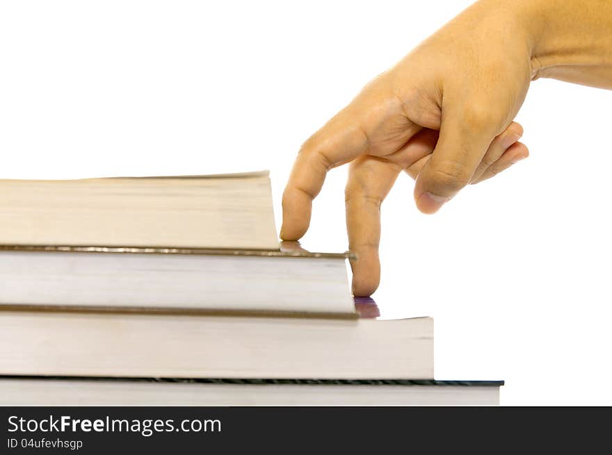 Hand and book stairs isolated on white background