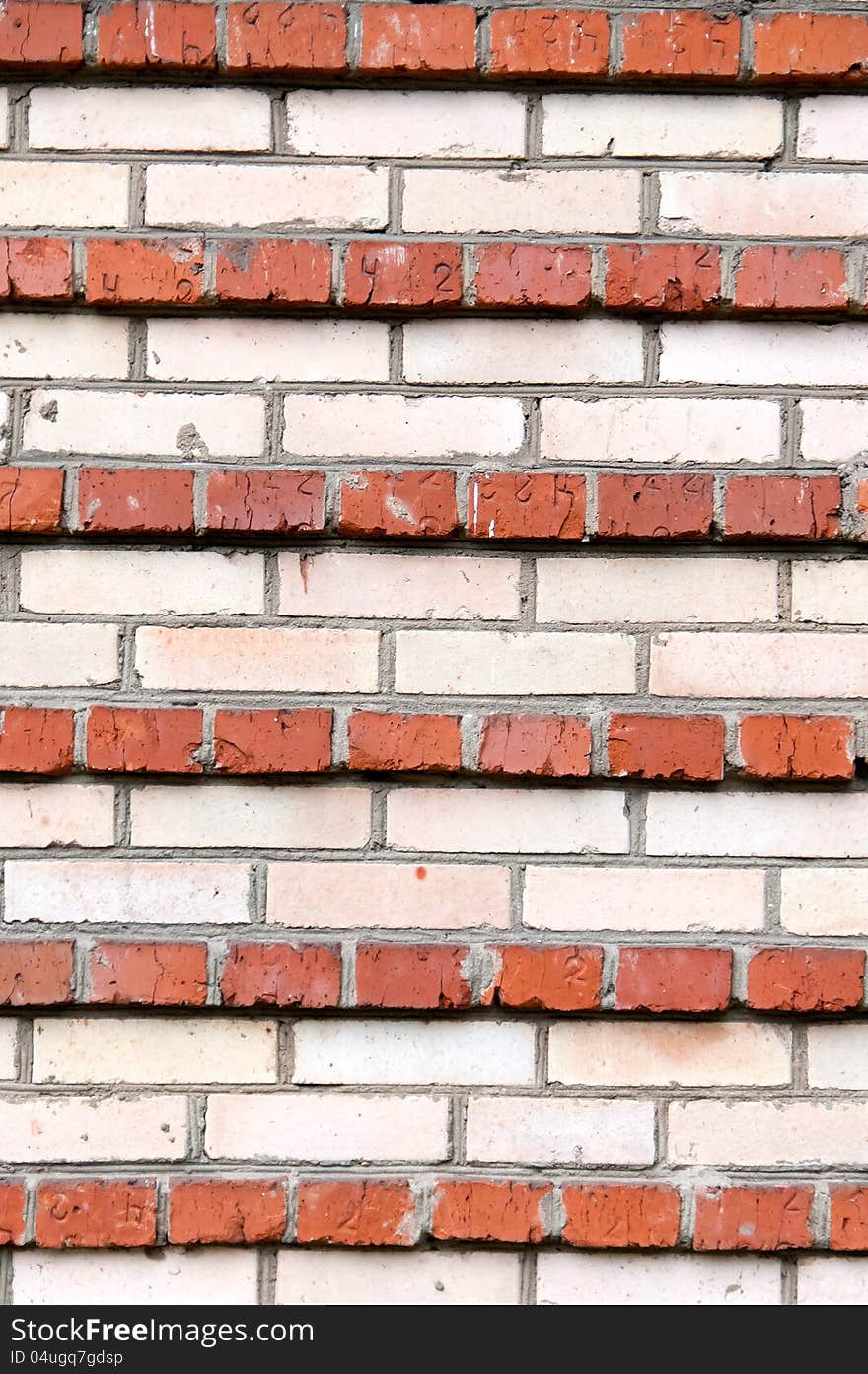 Background of the stripes of red and white brick