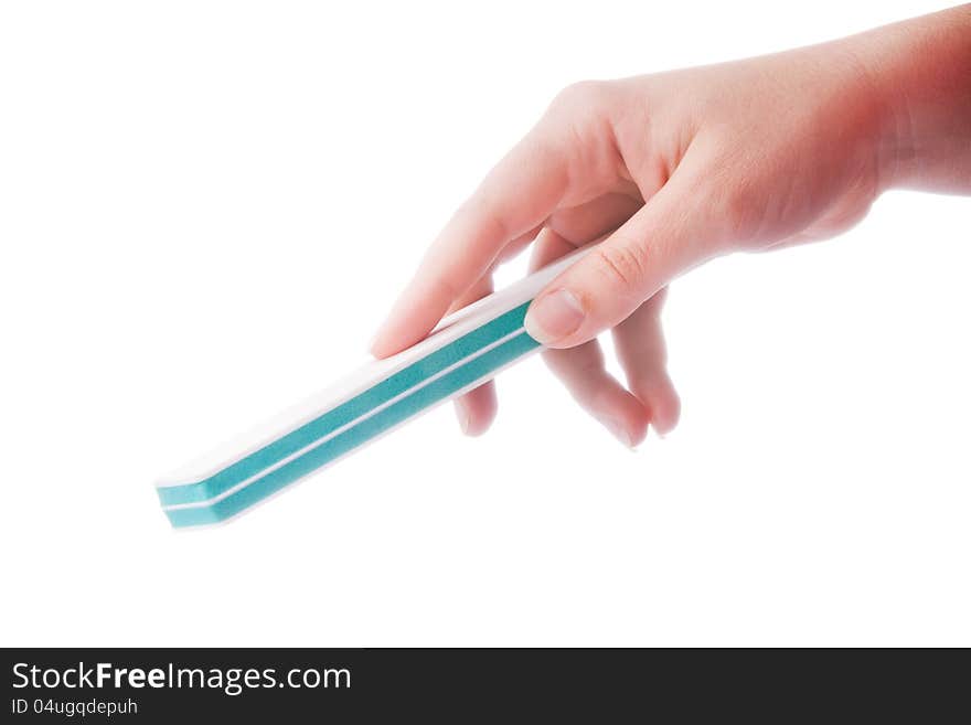 Woman s hand with the nail file isolated