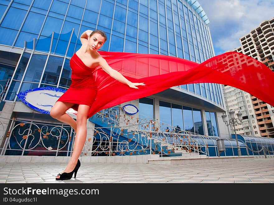 Young Beautiful girl with the red