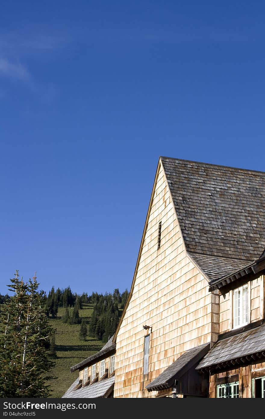 A resort of wooden structure on top of a mountain. A resort of wooden structure on top of a mountain