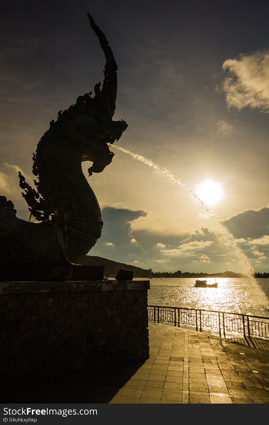 Head of Naka statue spray water