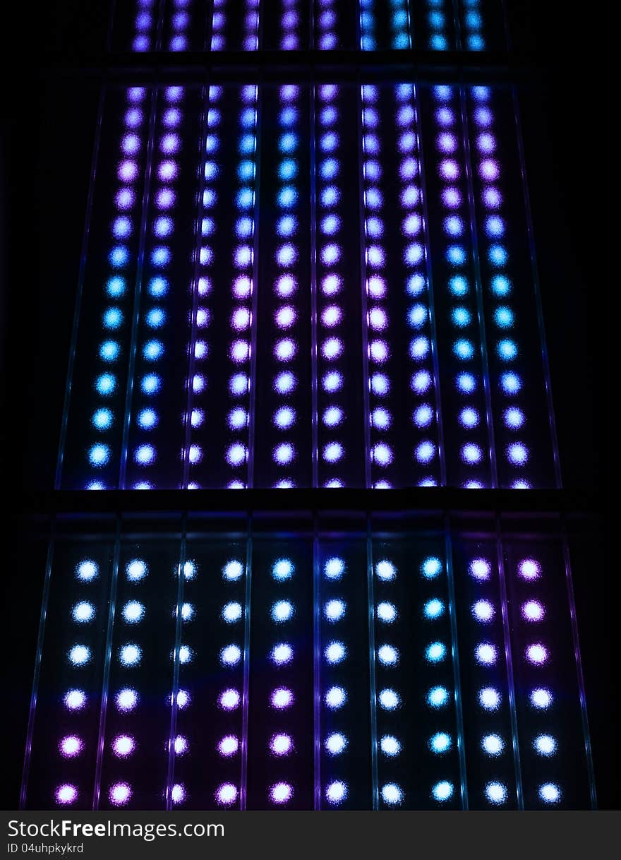 Colorful light spots display matrix background black. Colorful light spots display matrix background black