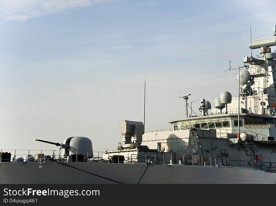 Military anti-submarine ship, ship gun and modern system of a radar.