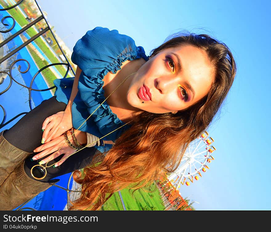 Image of a girl in an amusement park. Image of a girl in an amusement park