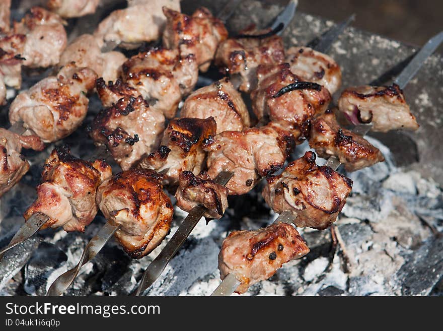 Barbecue meat prepared on fire