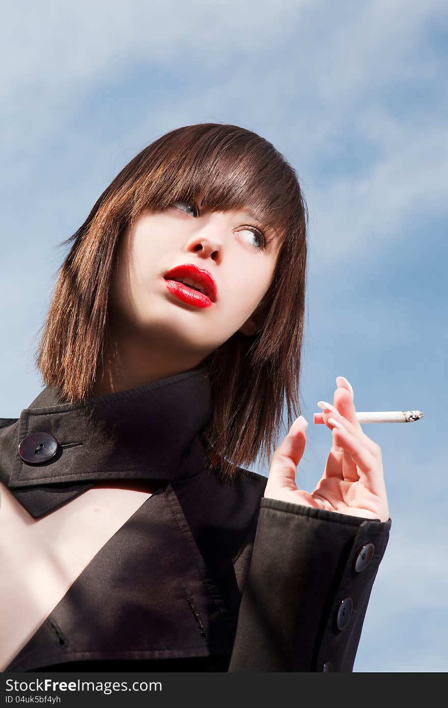 Elegant girl with a cigarette