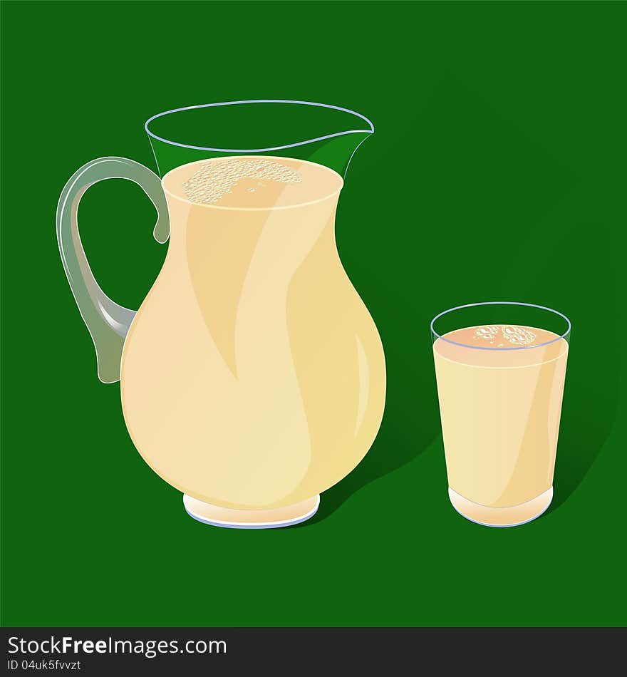 Pitcher and a glass with a drink in the green