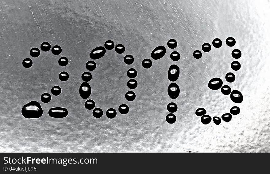 New year 2013. Abstract background of water drops on a black background