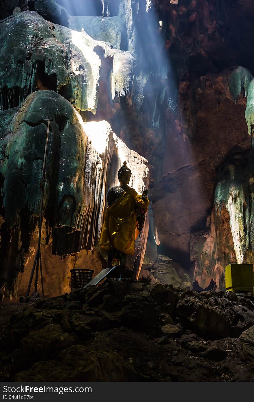 Buddha statue in cavern at Ratchaburi.