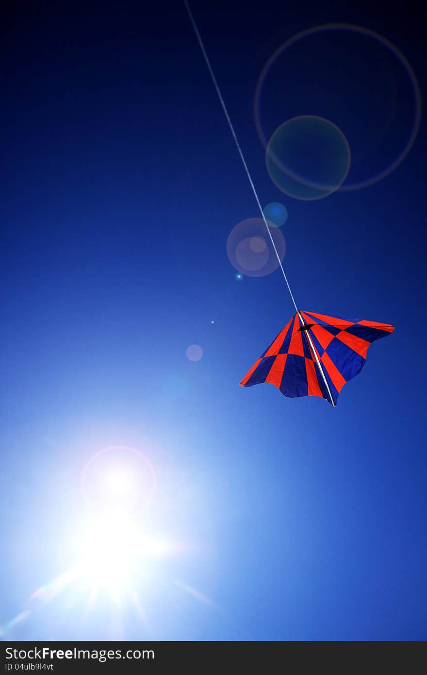 Kite On Blue Sky