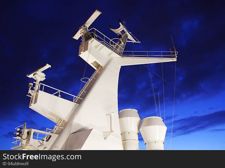 chimney of the ship during the night on a blue background