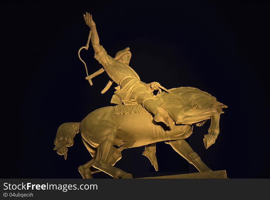 Monument to the Bashkir revolutionary hero Salavat Yulaev on the black background in the night. Monument to the Bashkir revolutionary hero Salavat Yulaev on the black background in the night