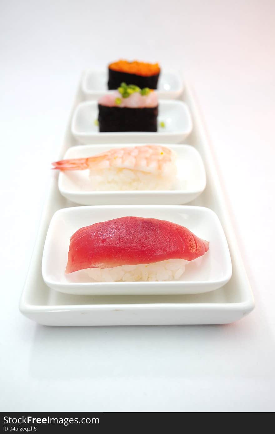 Sushi is Japanese food consisting of cooked vinegared rice combined with other ingredients  usually raw fish or other seafood. Sushi is Japanese food consisting of cooked vinegared rice combined with other ingredients  usually raw fish or other seafood.