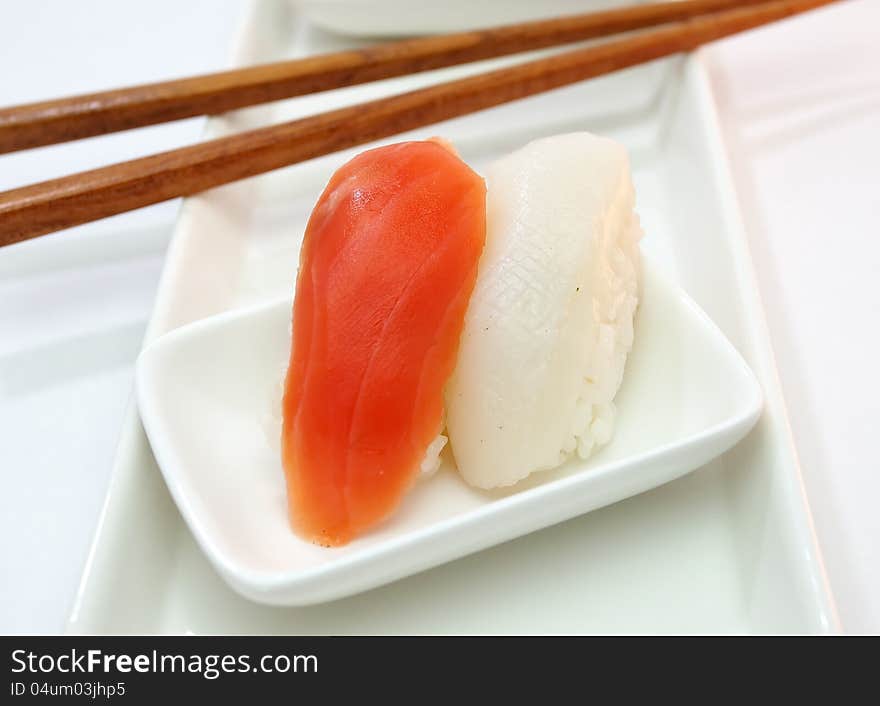 Sushi is Japanese food consisting of cooked vinegared rice combined with other ingredients  usually raw fish or other seafood. Sushi is Japanese food consisting of cooked vinegared rice combined with other ingredients  usually raw fish or other seafood.