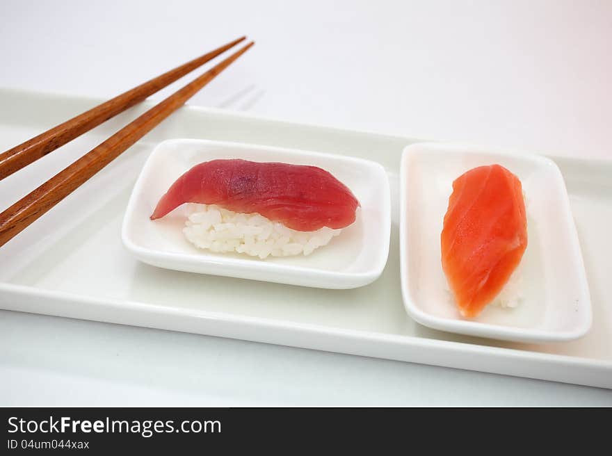 Sushi is Japanese food consisting of cooked vinegared rice combined with other ingredients  usually raw fish or other seafood. Sushi is Japanese food consisting of cooked vinegared rice combined with other ingredients  usually raw fish or other seafood.