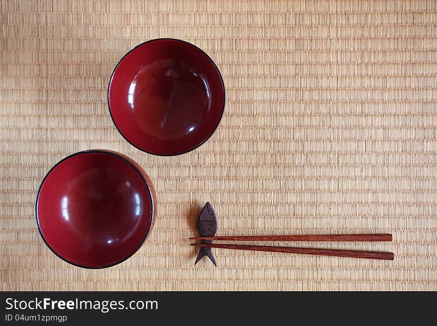 Chopsticks ans two bowls in asian set table. Chopsticks ans two bowls in asian set table