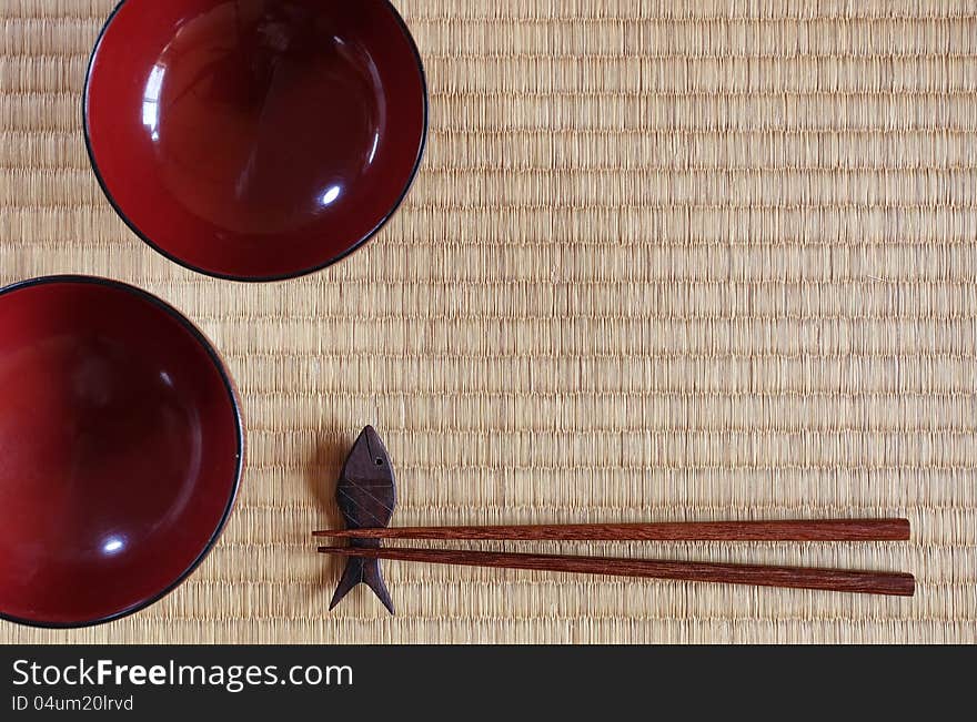 Chopsticks ans two bowls in asian set table. Chopsticks ans two bowls in asian set table