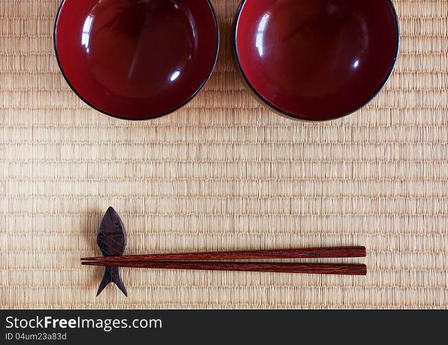 Chopsticks ans two bowls in asian set table. Chopsticks ans two bowls in asian set table