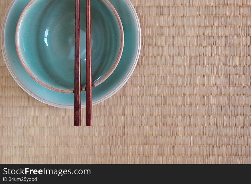 Chopsticks with bowl in asian set table. Chopsticks with bowl in asian set table