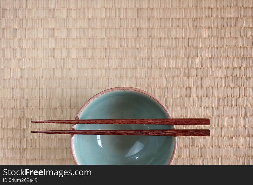 Chopsticks with bowl in asian set table. Chopsticks with bowl in asian set table