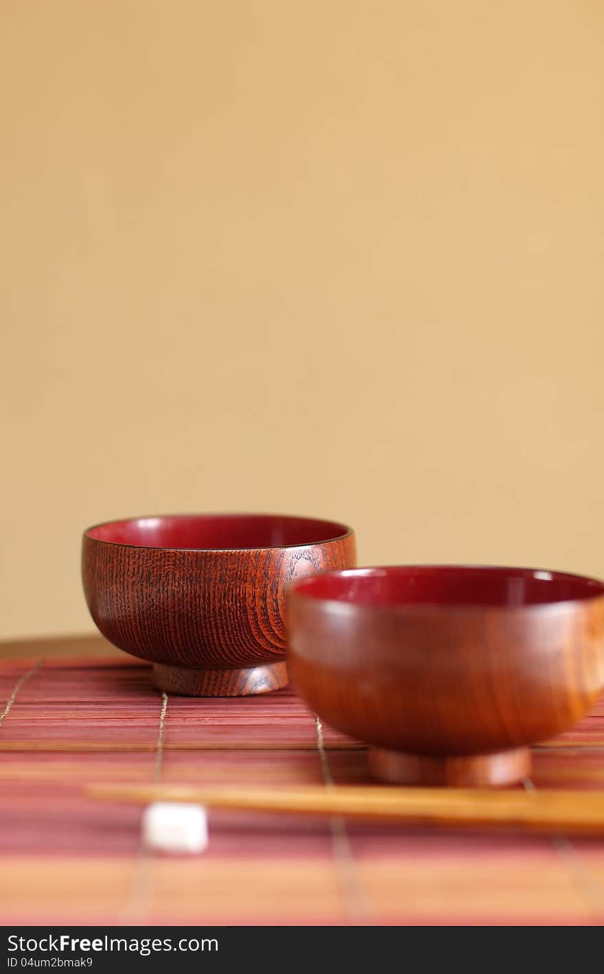 Chopsticks and two soup bowls  in asian set table. Chopsticks and two soup bowls  in asian set table