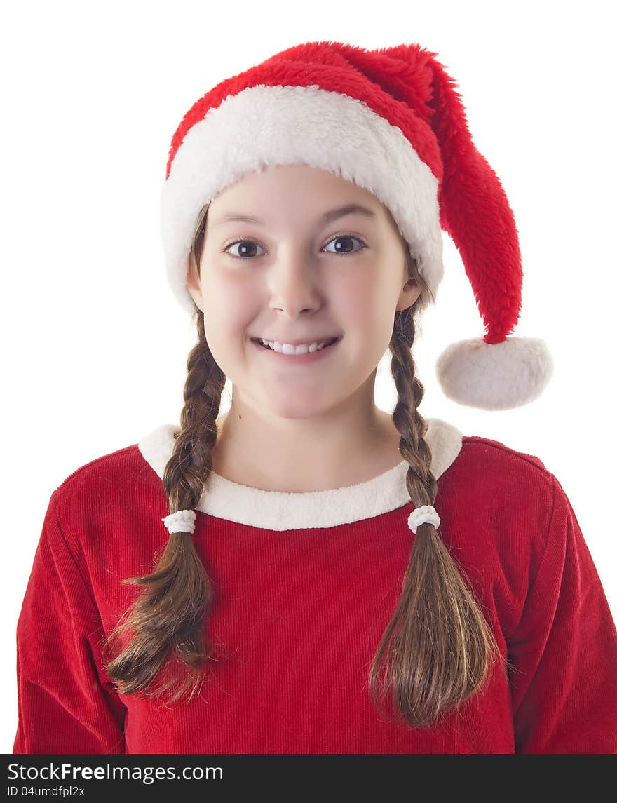 Beautiful girl dressed in Christmas clothes and red santa hat isolated on white background. Beautiful girl dressed in Christmas clothes and red santa hat isolated on white background