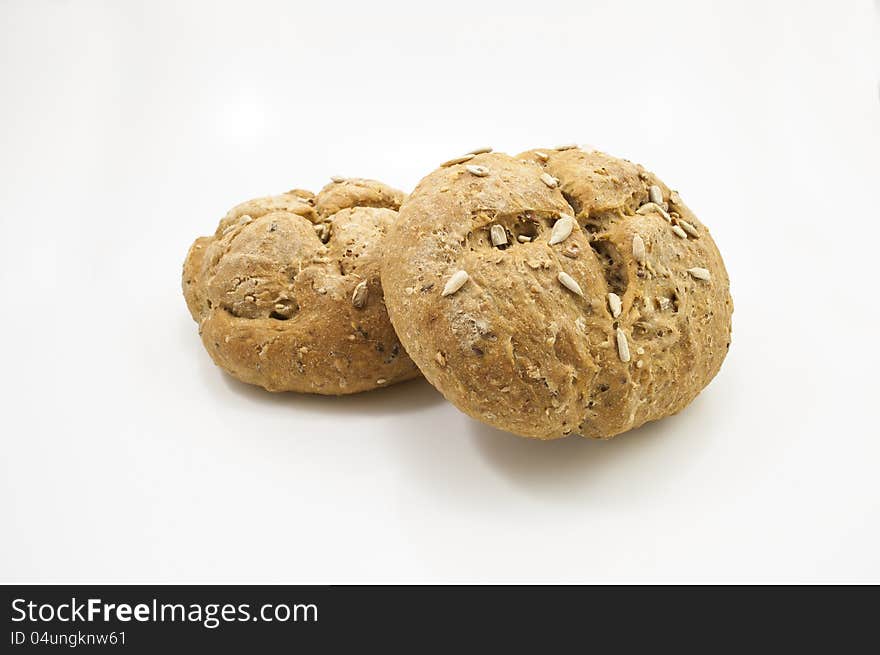 Seeded Italian bread in white background. Seeded Italian bread in white background