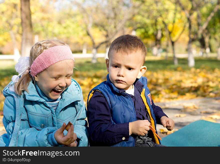 Young Girl Laughing in Outdoor Autumn Setting