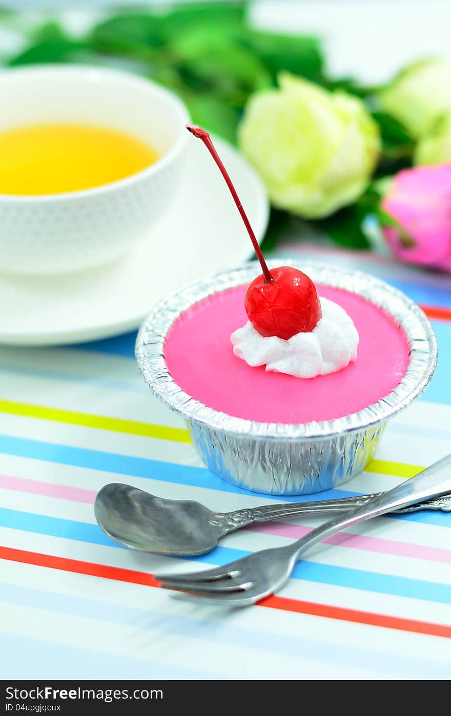 Red cherry cup cake for coffee break time