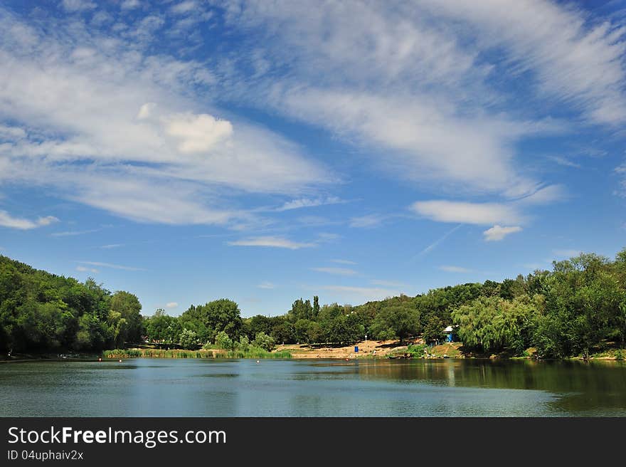 Sky under  lake, city park. Sky under  lake, city park