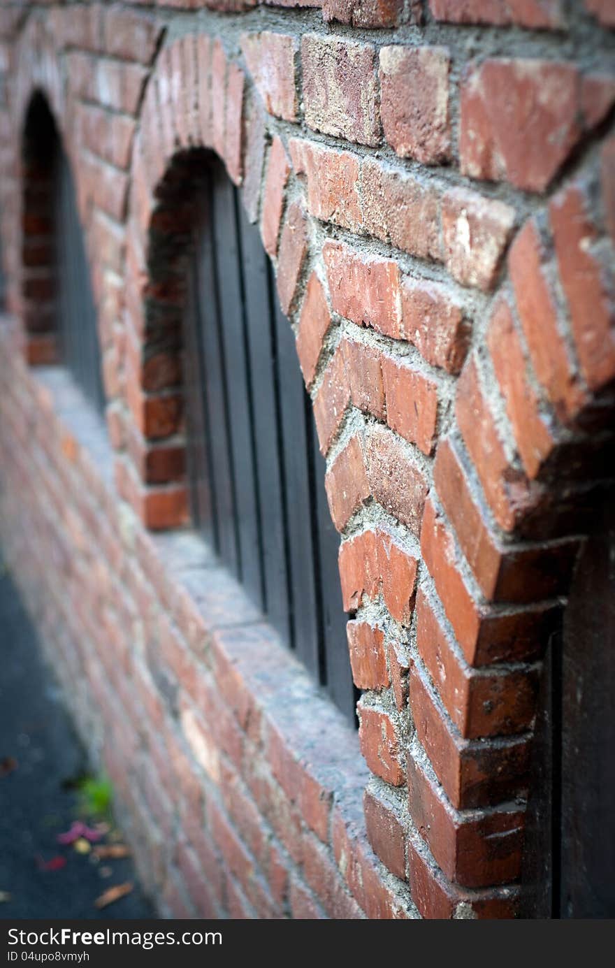 Brick and wood made fence. Brick and wood made fence