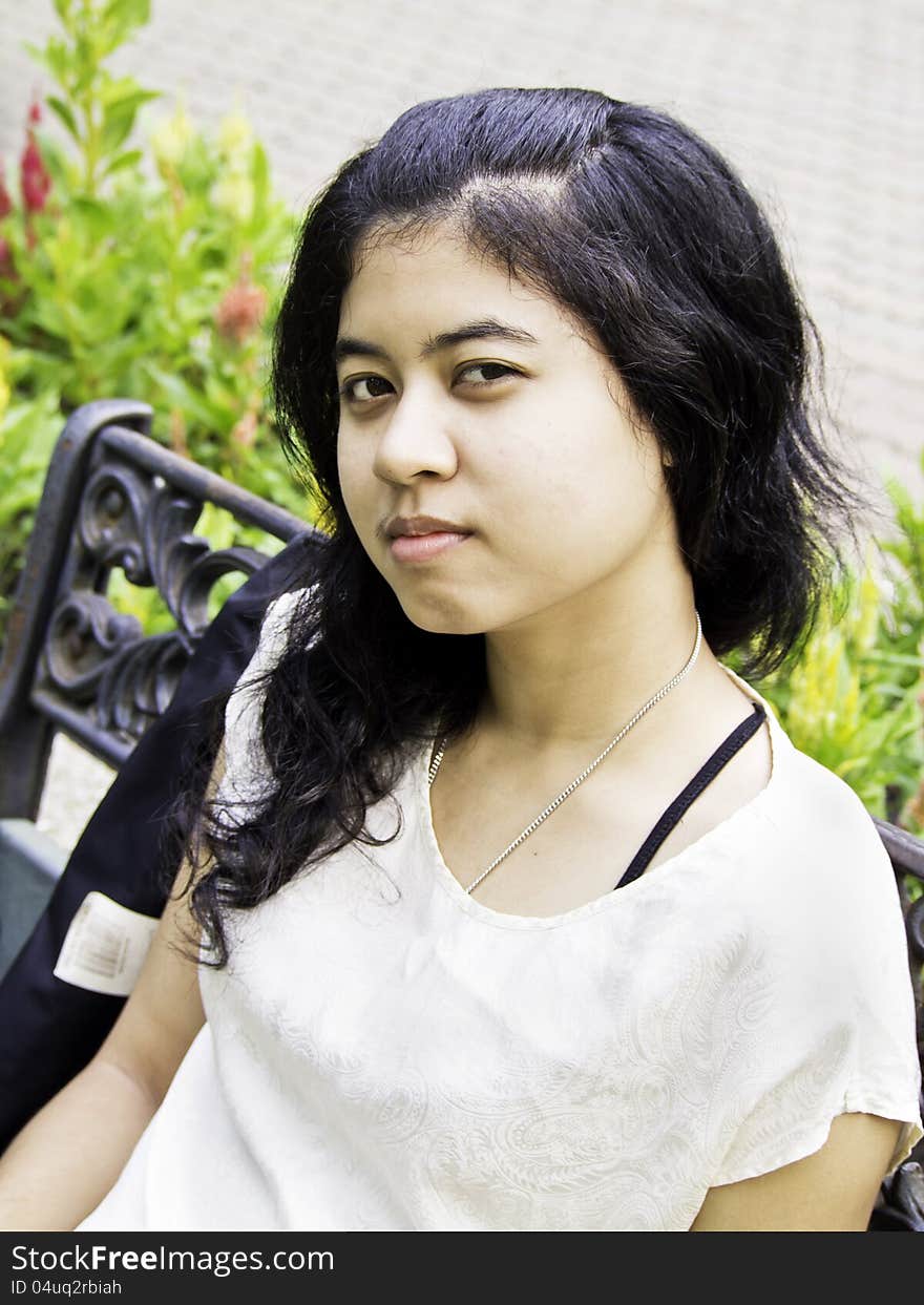 Haughty young woman at outdoor park