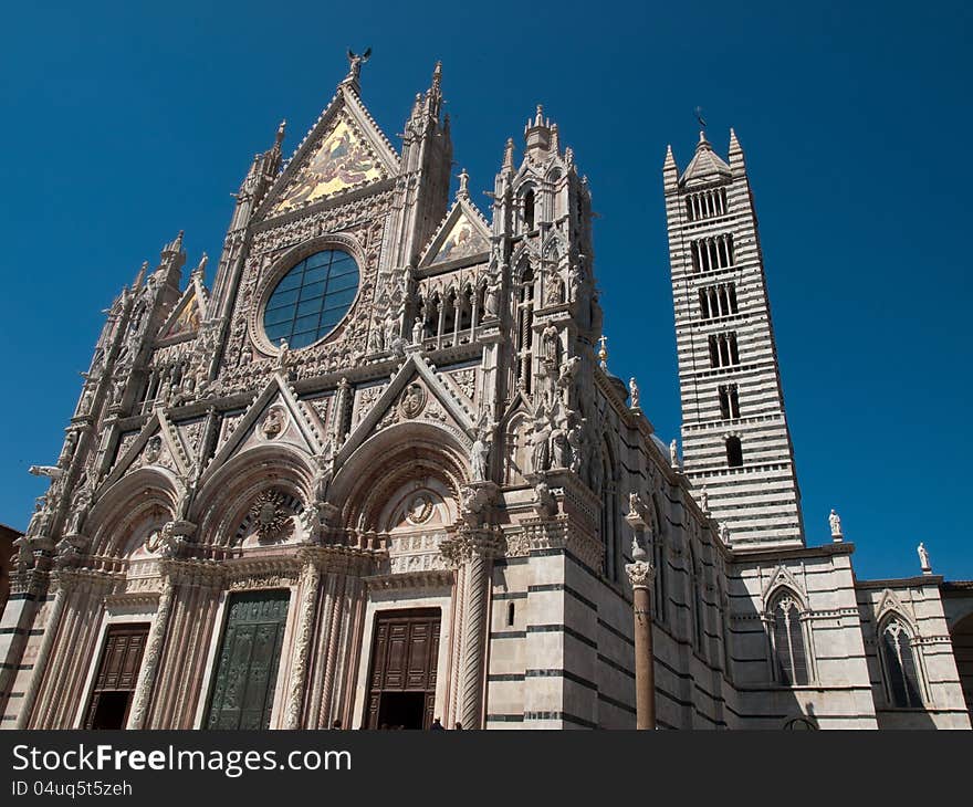 The facade of the Cathedral in Siena. The facade of the Cathedral in Siena