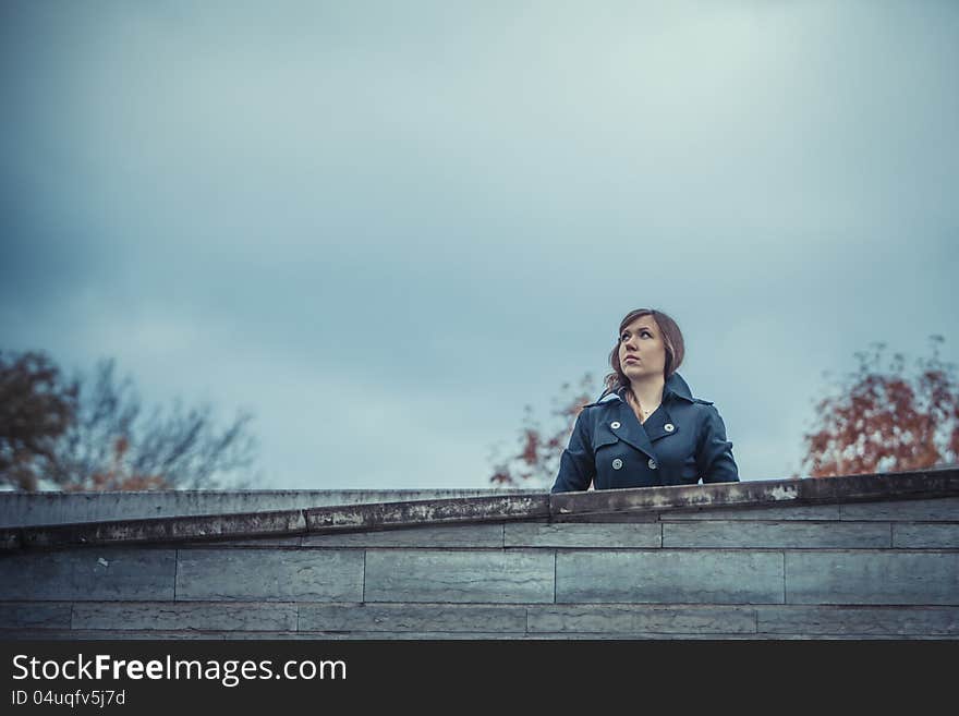 Girl looks on the sky