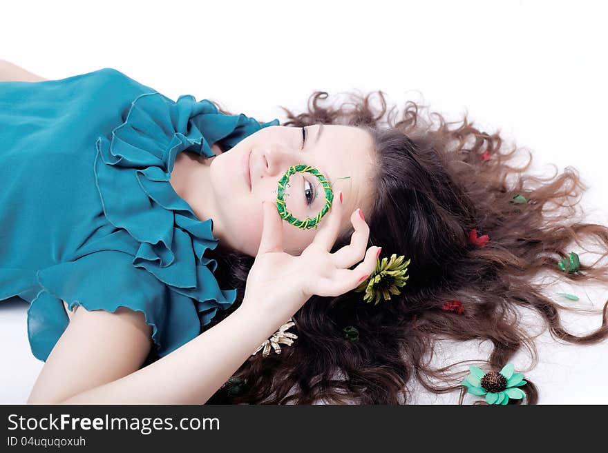 Portrait of a girl posing with long curly hair isolated