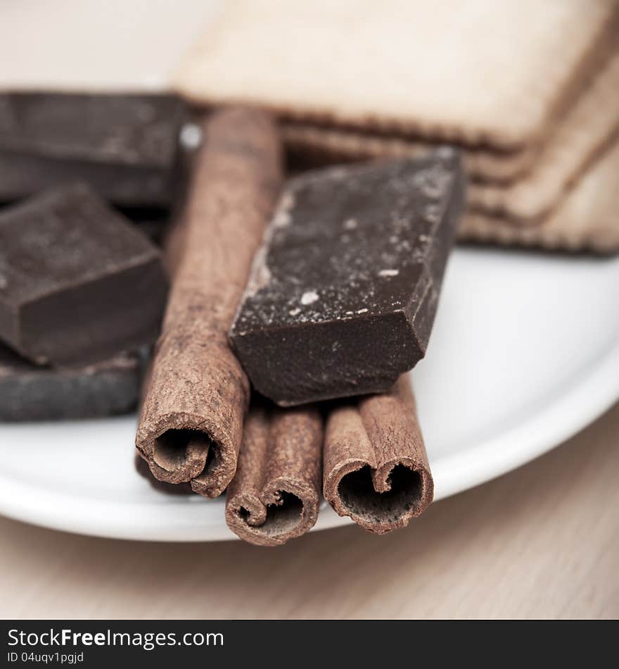 Cinnamon Sticks with chocolate on table