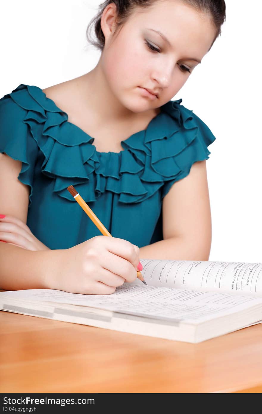 Cute girl writes a white background isolated