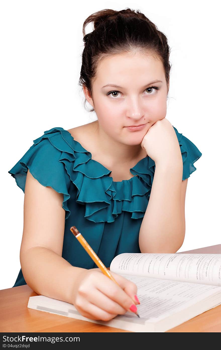 Pretty girl writes a white background isolated