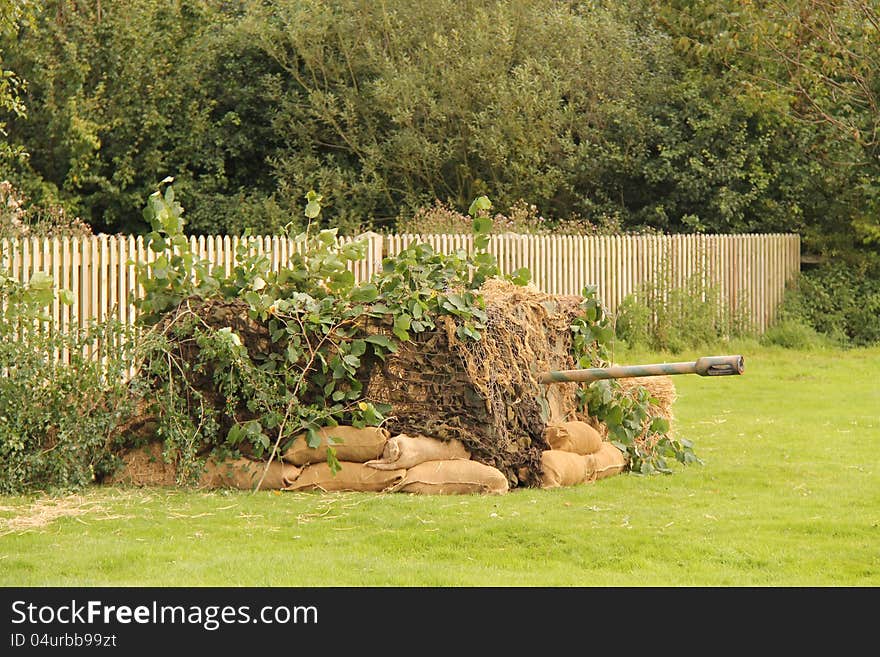 A Mock-up of a Camouflaged Gun Enplacement. A Mock-up of a Camouflaged Gun Enplacement.