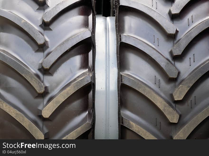 A close-up of new large tractor tire. A close-up of new large tractor tire