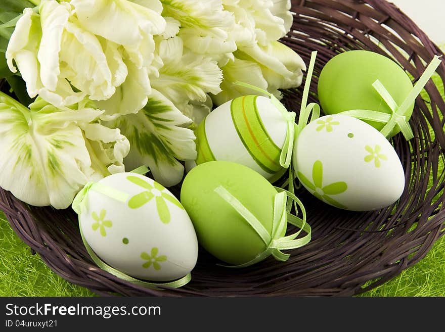 Easter baskets with eggs and tulips. Easter baskets with eggs and tulips