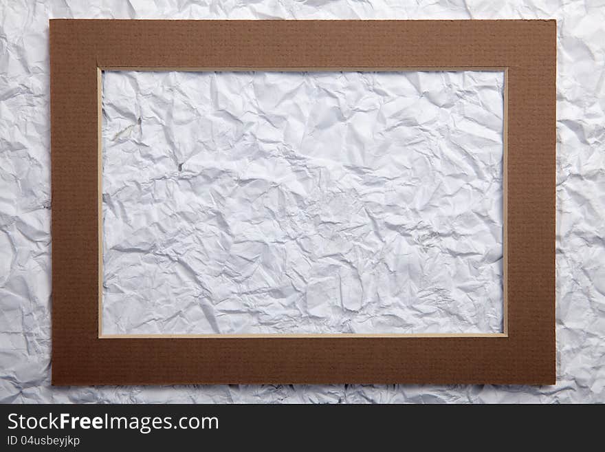 Old crumpled paper texture with frame top. Old crumpled paper texture with frame top