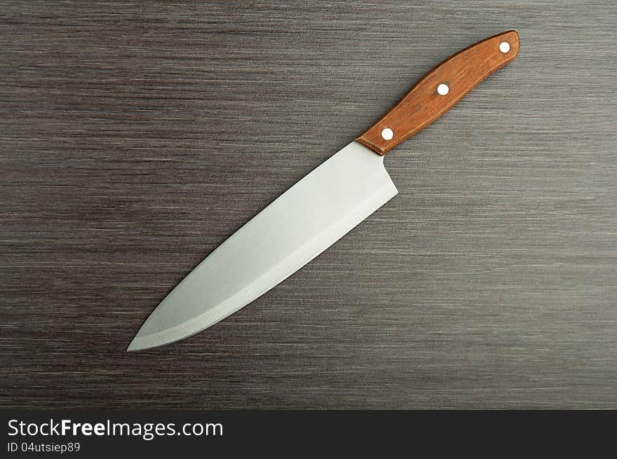 Kitchen Knife On  Wooden Background