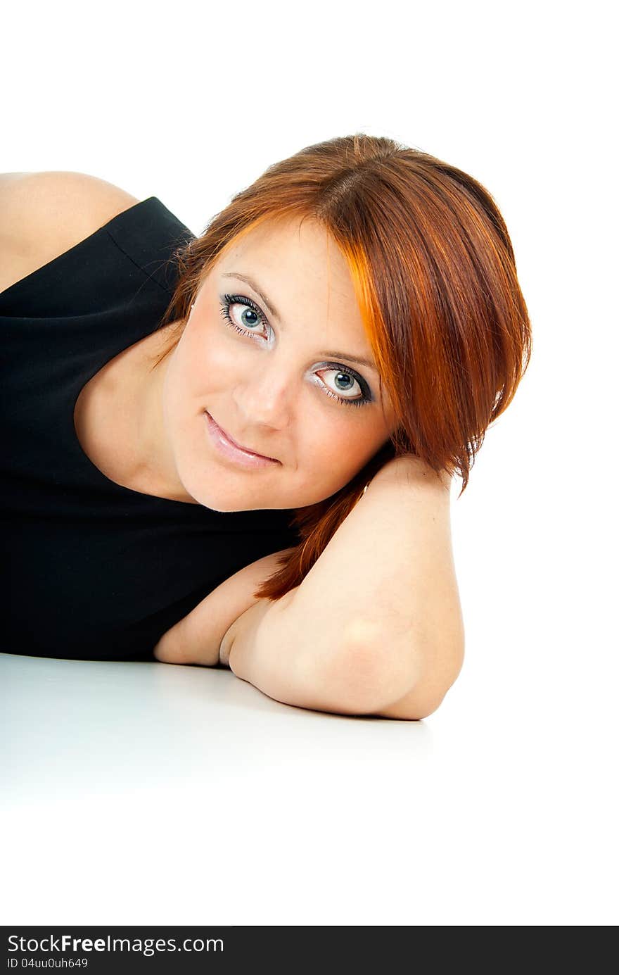 Beautiful girl lying on a white background