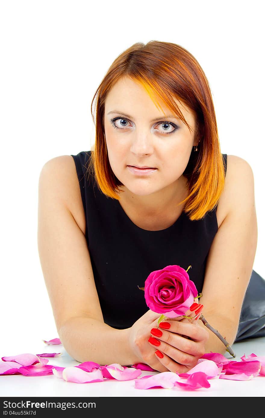 Portrait of a beautiful girl with a rose