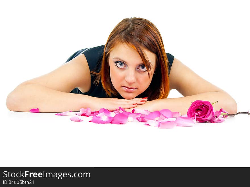 Beautiful girl with rose petals